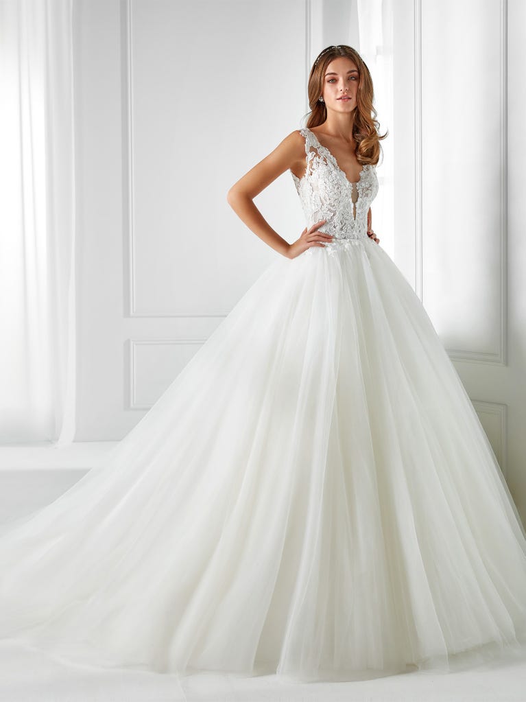 Sleeveless A-line organza wedding dress with plunging V-neck. The lace on the bodice is romantic yet modern.