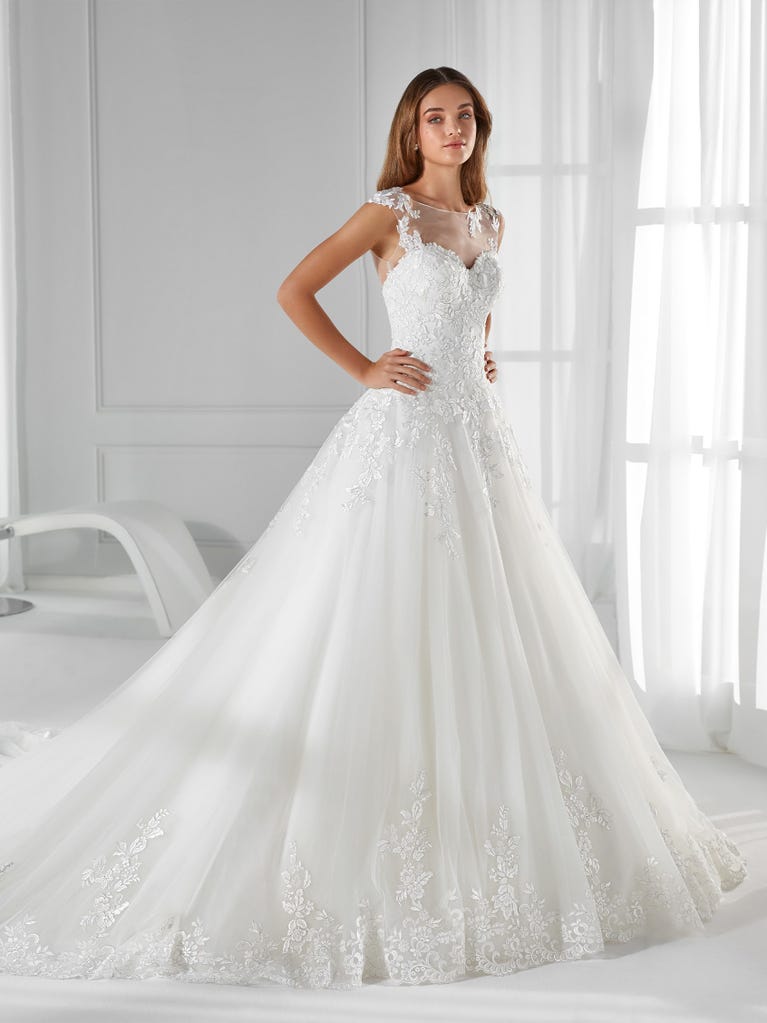 Sleeveless A-line organza wedding dress with plunging V-neck. The lace on the bodice is romantic yet modern.