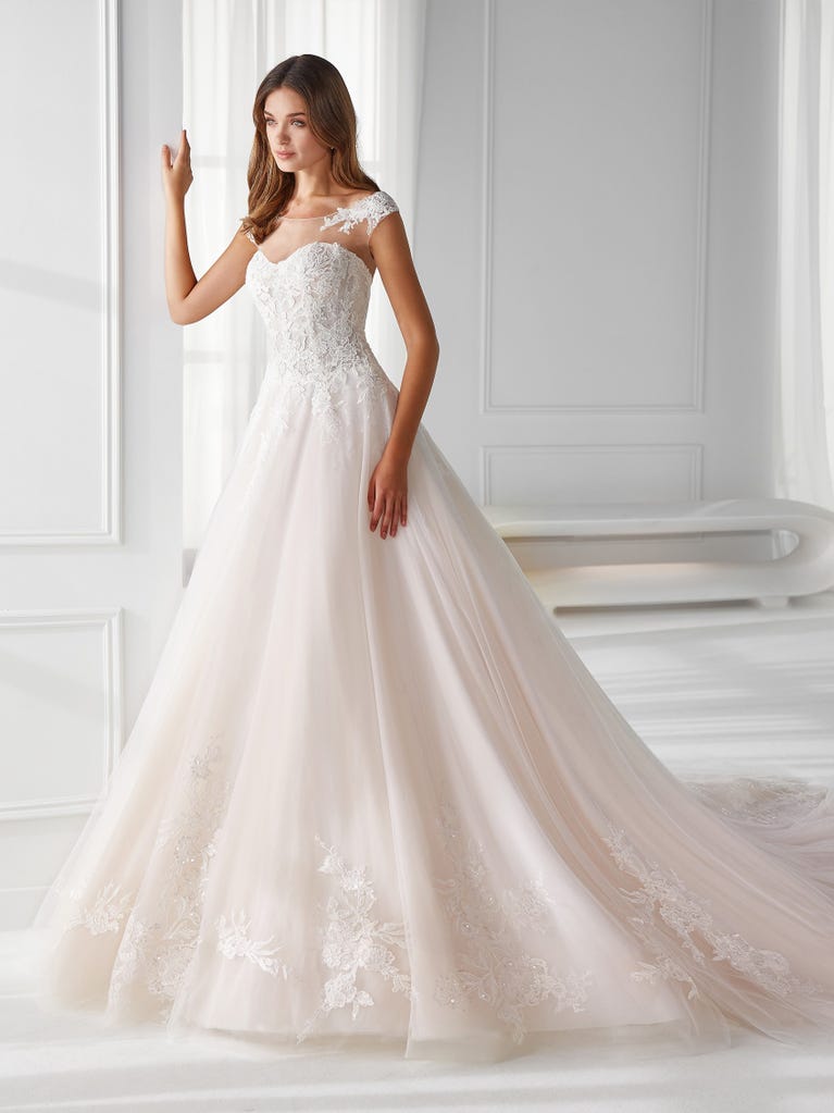 Sleeveless A-line organza wedding dress with plunging V-neck. The lace on the bodice is romantic yet modern.
