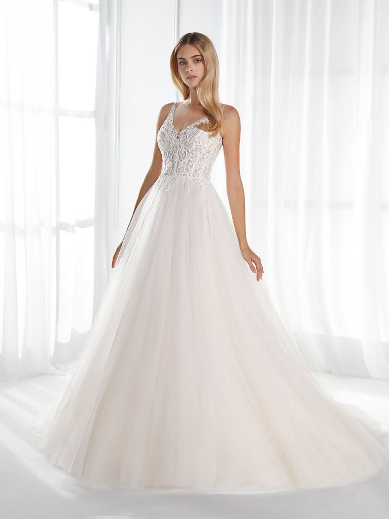 Sleeveless A-line organza wedding dress with plunging V-neck. The lace on the bodice is romantic yet modern.