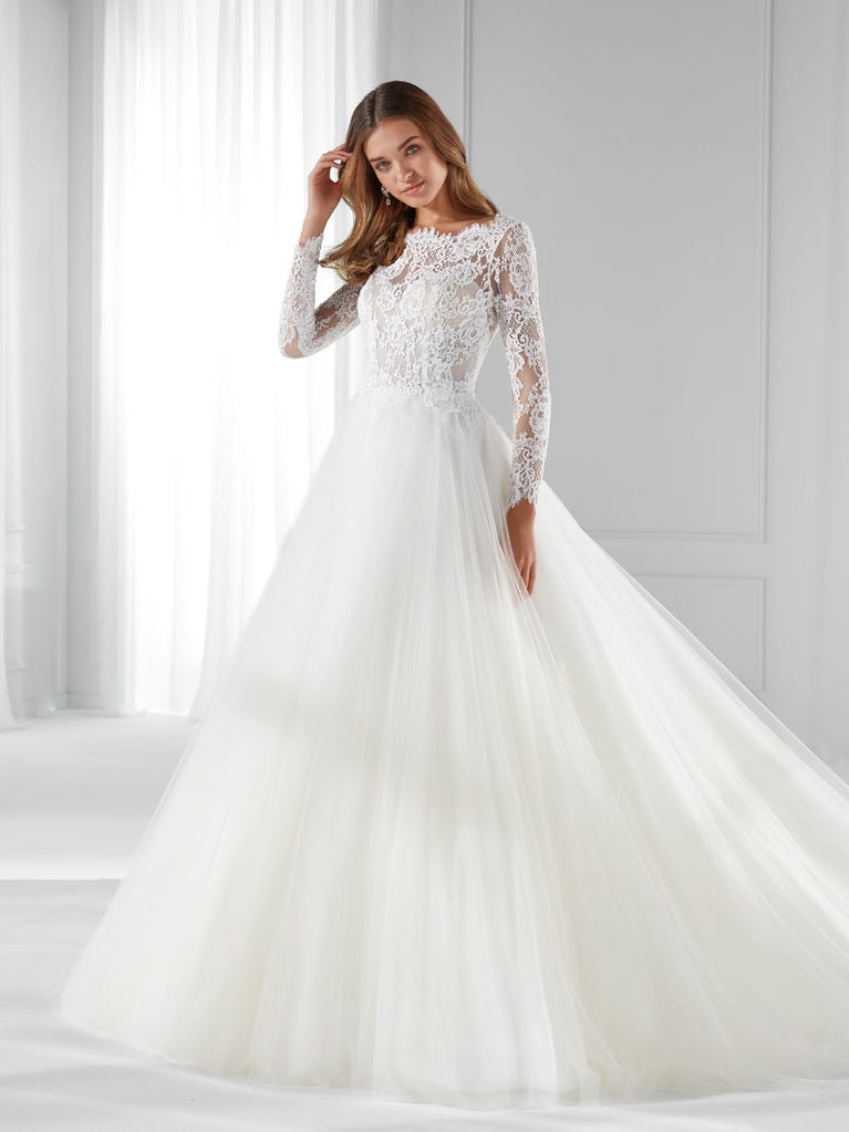 Sleeveless A-line organza wedding dress with plunging V-neck. The lace on the bodice is romantic yet modern.