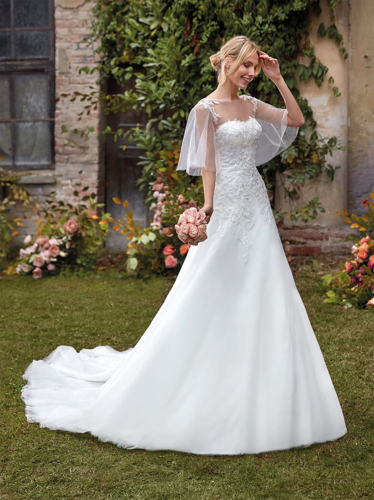 Delightful, satin A-line gown with polka dot, glitter tulle skirt. And you will be wonderful!