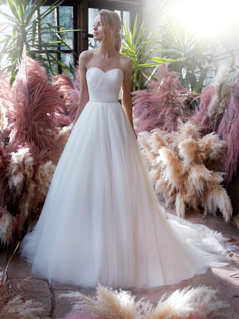 Delightful, satin A-line gown with polka dot, glitter tulle skirt. And you will be wonderful!