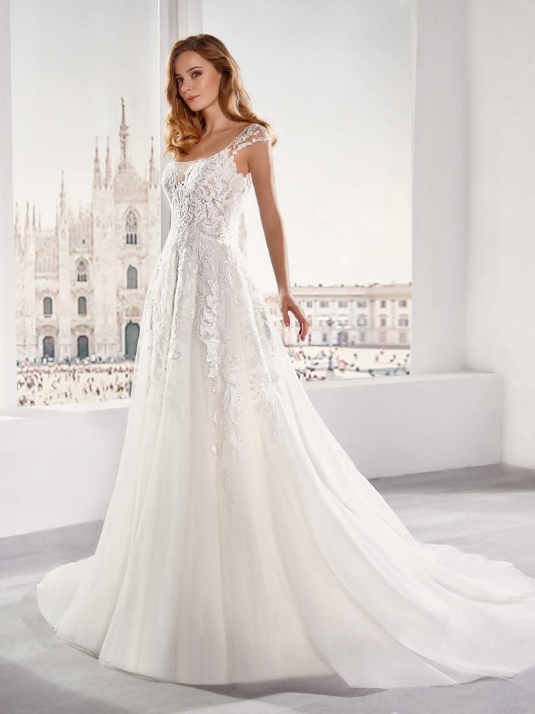 Delightful, satin A-line gown with polka dot, glitter tulle skirt. And you will be wonderful!