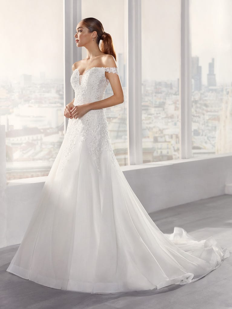 Delightful, satin A-line gown with polka dot, glitter tulle skirt. And you will be wonderful!