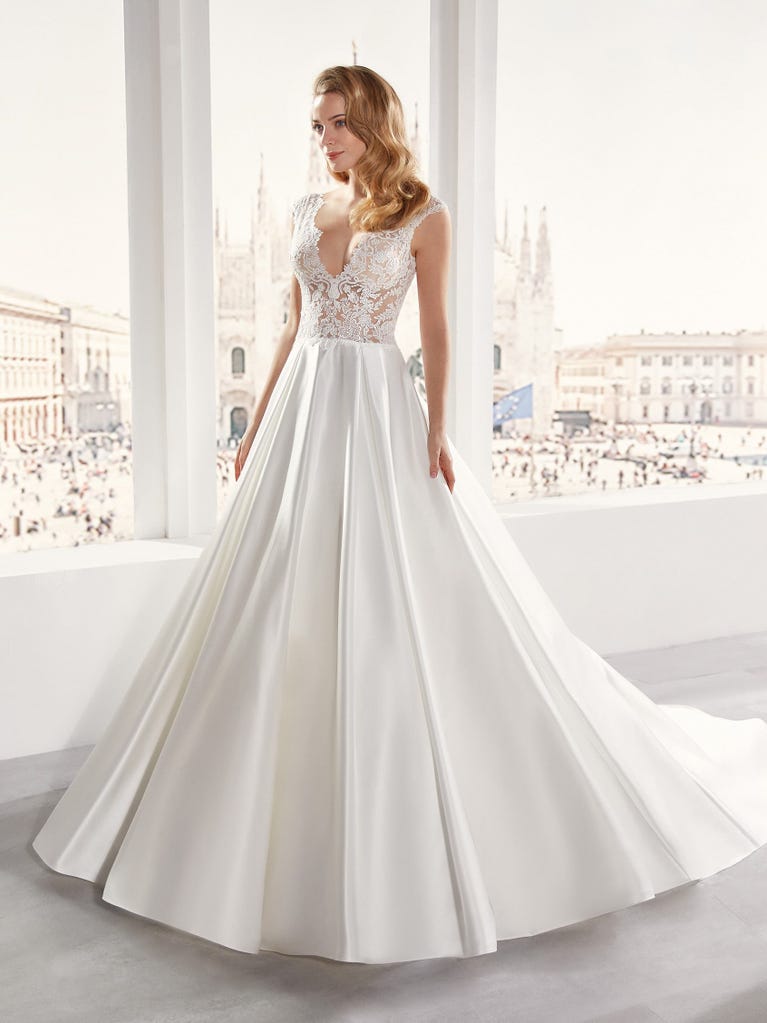 Delightful, satin A-line gown with polka dot, glitter tulle skirt. And you will be wonderful!