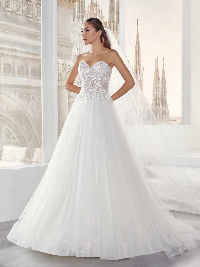 Delightful, satin A-line gown with polka dot, glitter tulle skirt. And you will be wonderful!